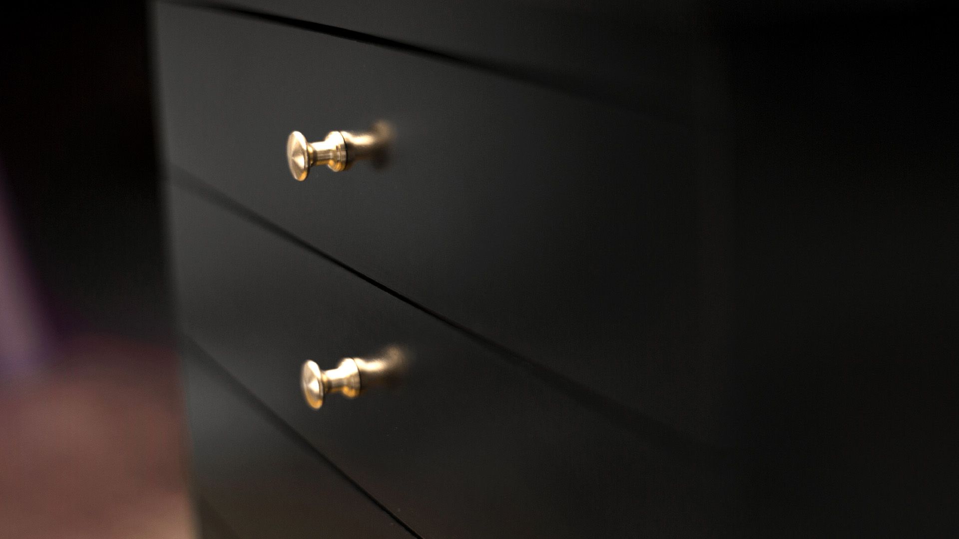 Close up of drawer pulls on music cabinet